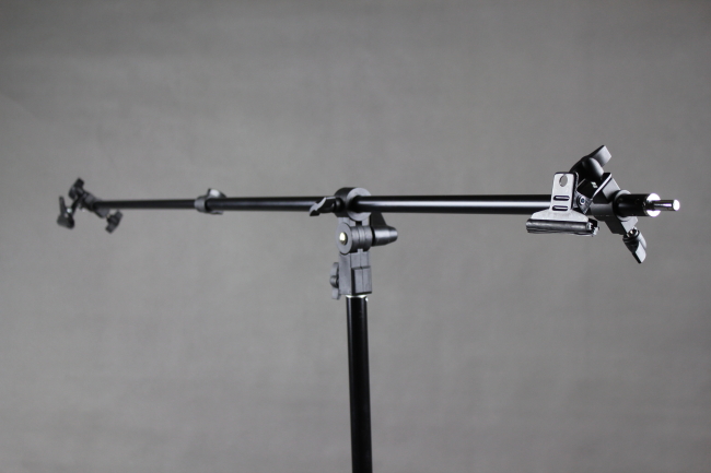 Teleskopická tyč na fotopozadí