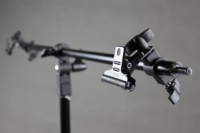 Teleskopická tyč na fotopozadí