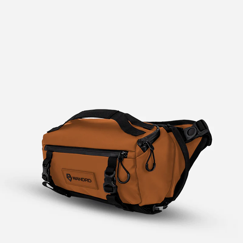 Fotobrašna WANDRD ROGUE Sling 6L Sedona Orange