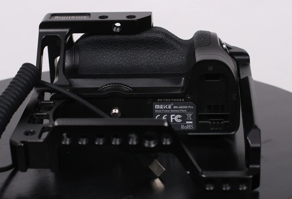 Cam Cage SmallRig + battery grip Meike pro Sony a6500